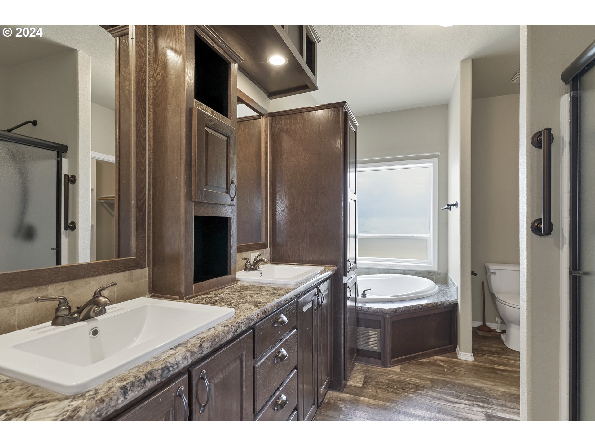 610 Vaughan Lane Lebanon, OR 97355 - Photo 20 of 35 a bathroom with a double vanity sink mirror and double