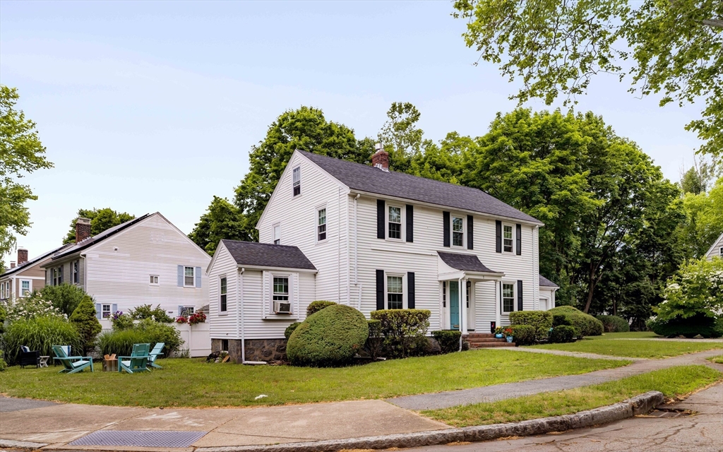 7 St Marys Road Milton, MA 02186 - Photo 29 of 31 a view of a white house with a big yard plants and large trees