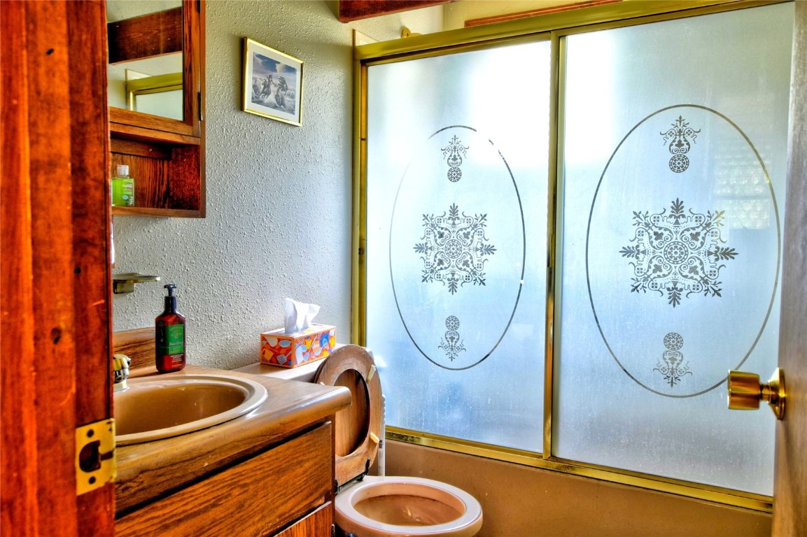 1722 Stagestop Road Jefferson, CO 80456 - Photo 16 of 25 a room with wooden floor pool table and mirror