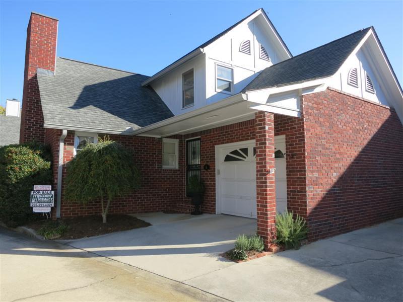 2 Robin Street Northwest, Unit 6 Rome, GA 30165 - Photo 1 of 1 a front view of a house with garden