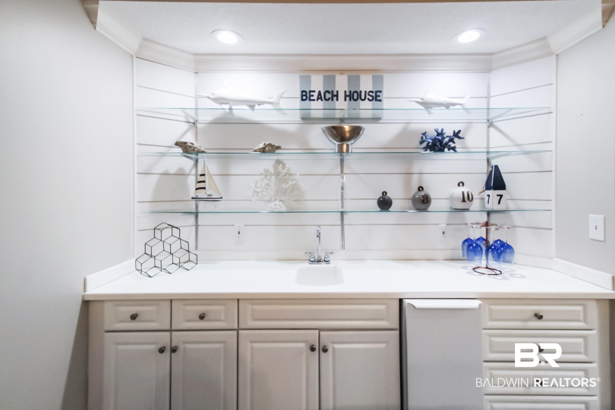 27580 Canal Road, Unit 1425 Orange Beach, AL 36561 - Photo 10 of 28 Indoor wet bar with white dishwasher and recessed lighting