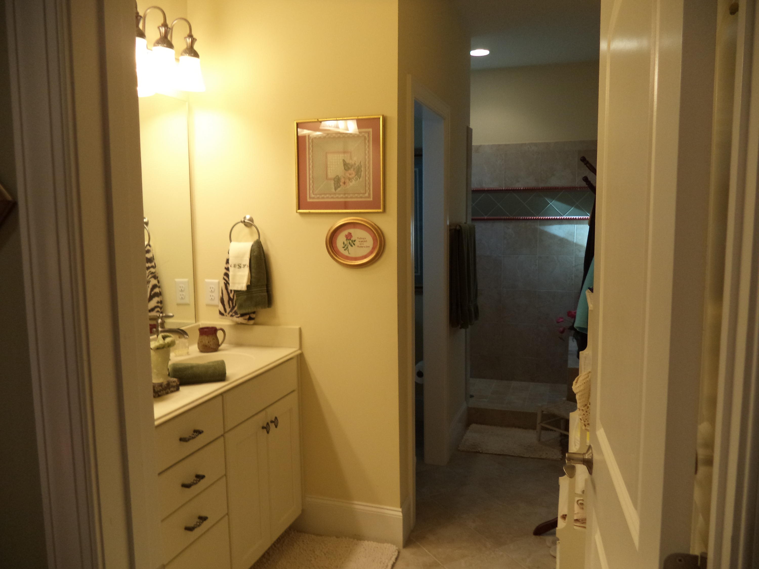 90 Whistling Straight Road Pinehurst, NC 28374 - Photo 11 of 25 Master bath offers a double vanity, lg walk in closet & a custom L shape tile shower