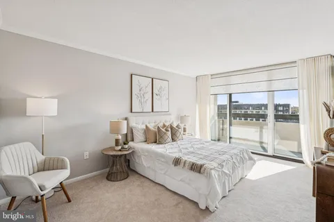 a bedroom with bed and window