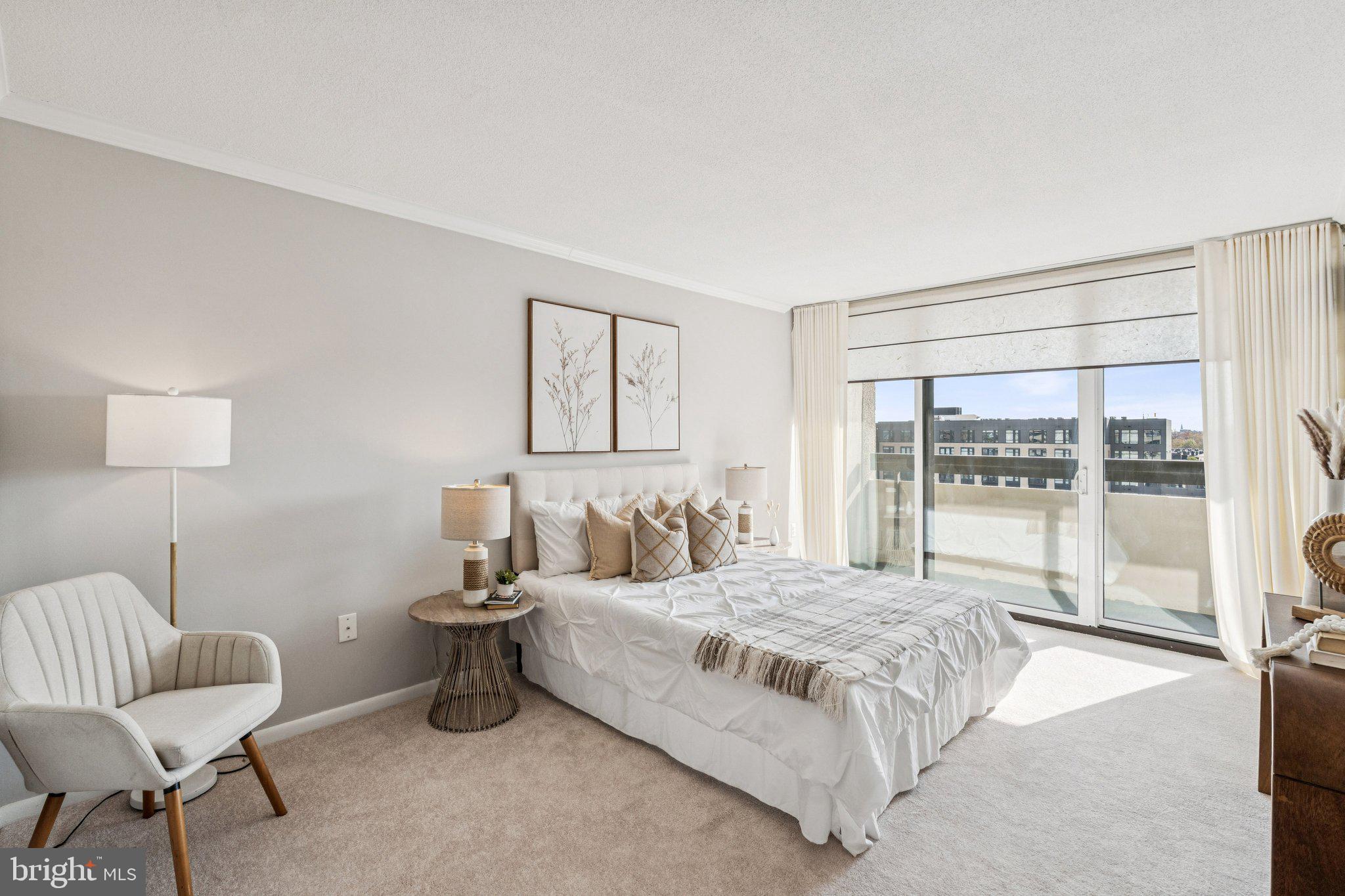 400 Madison Street, Unit 603 Alexandria, VA 22314 - Photo 19 of 46 a bedroom with a bed and a couch