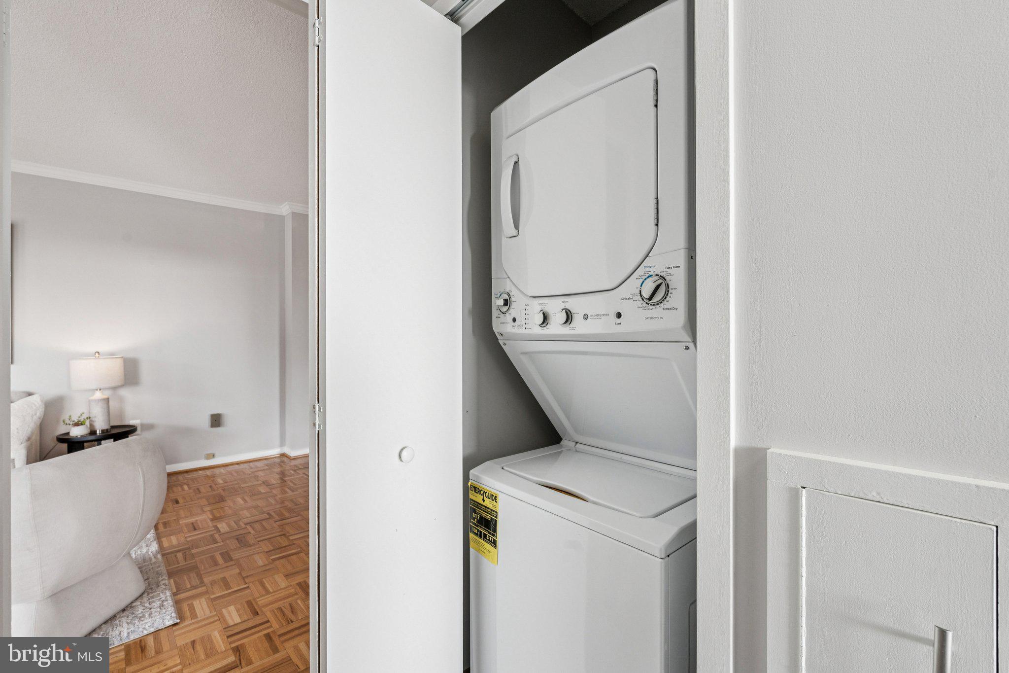 400 Madison Street, Unit 603 Alexandria, VA 22314 - Photo 28 of 46 a utility room with dryer and washer