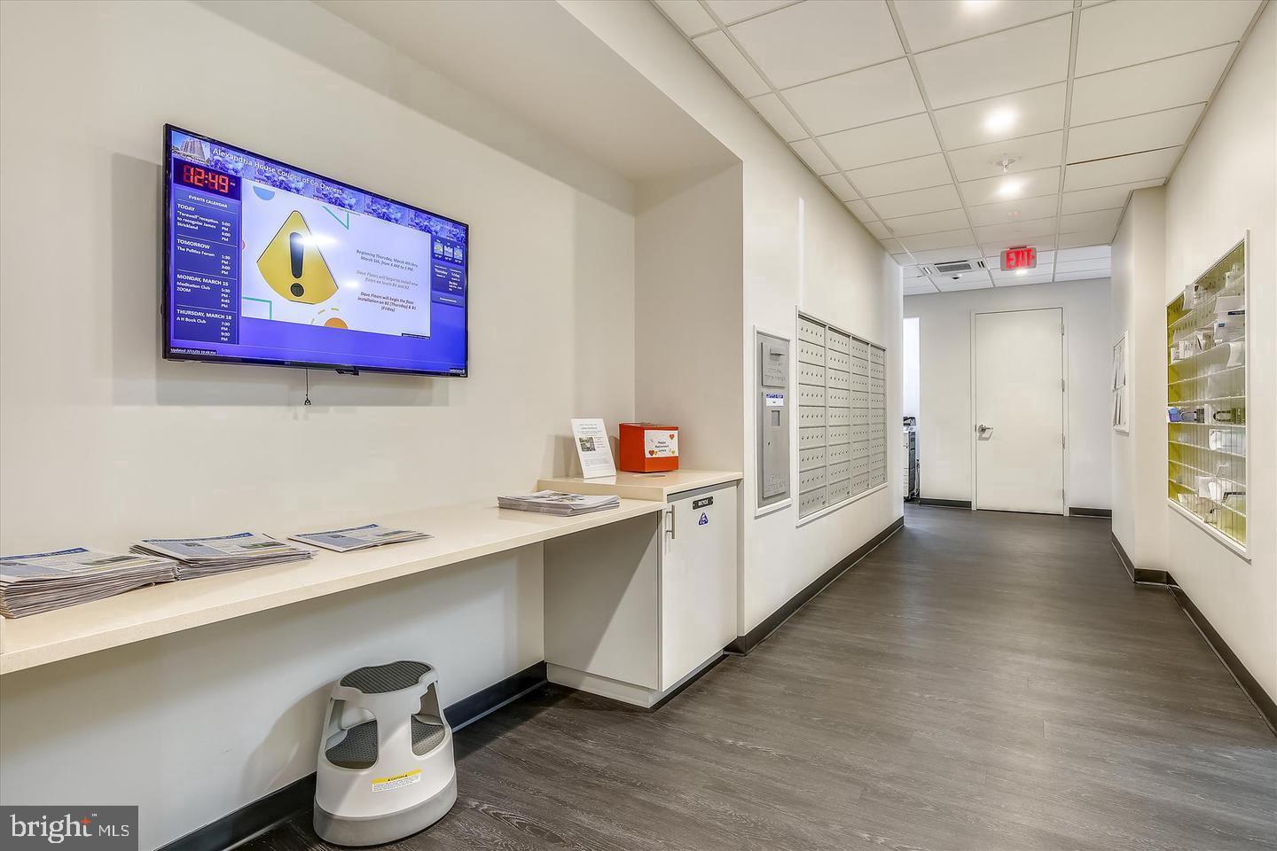 400 Madison Street, Unit 603 Alexandria, VA 22314 - Photo 42 of 46 a very nice looking room with wooden floor and furniture