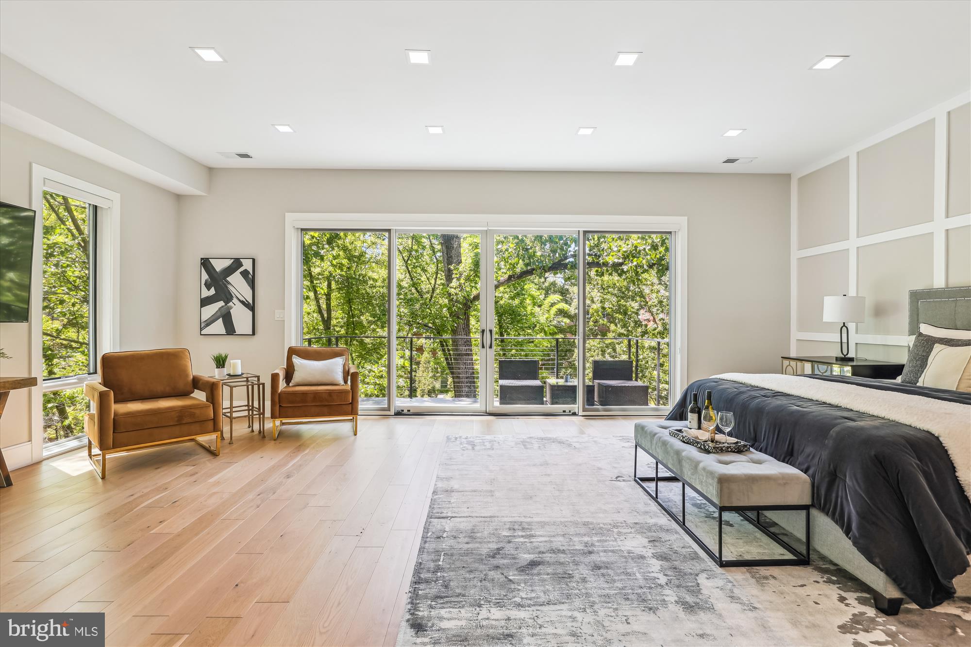 5706 Nevada Avenue Northwest Washington, DC 20015 - Photo 14 of 39 a spacious bedroom with a bed and a couch