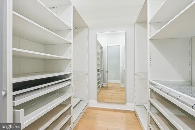 a bathroom with a tub and shower