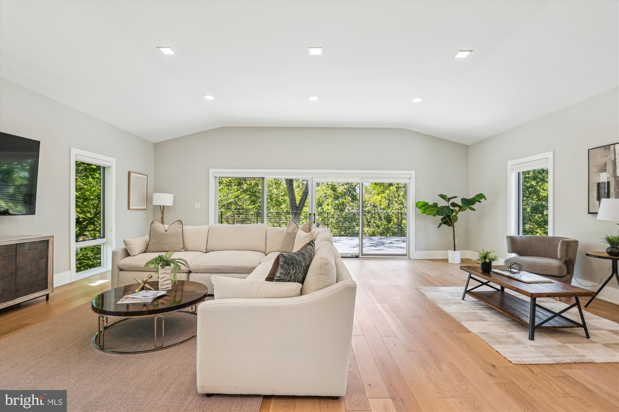 5706 Nevada Avenue Northwest Washington, DC 20015 - Photo 19 of 39 a living room with furniture and a large window