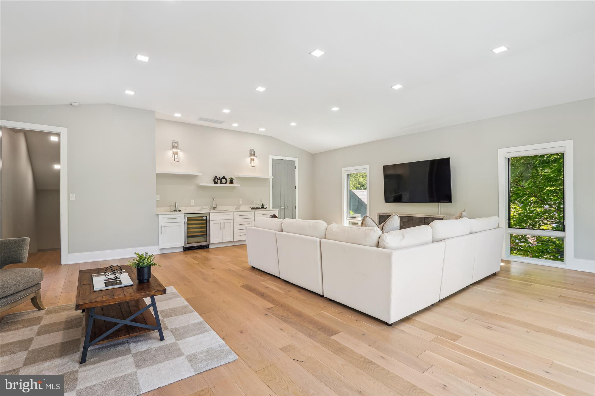 5706 Nevada Avenue Northwest Washington, DC 20015 - Photo 21 of 39 a living room with furniture and a flat screen tv