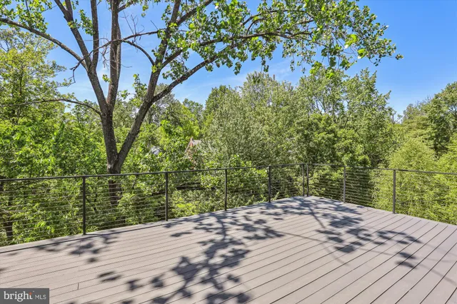 a view of a wooden floor and a yard