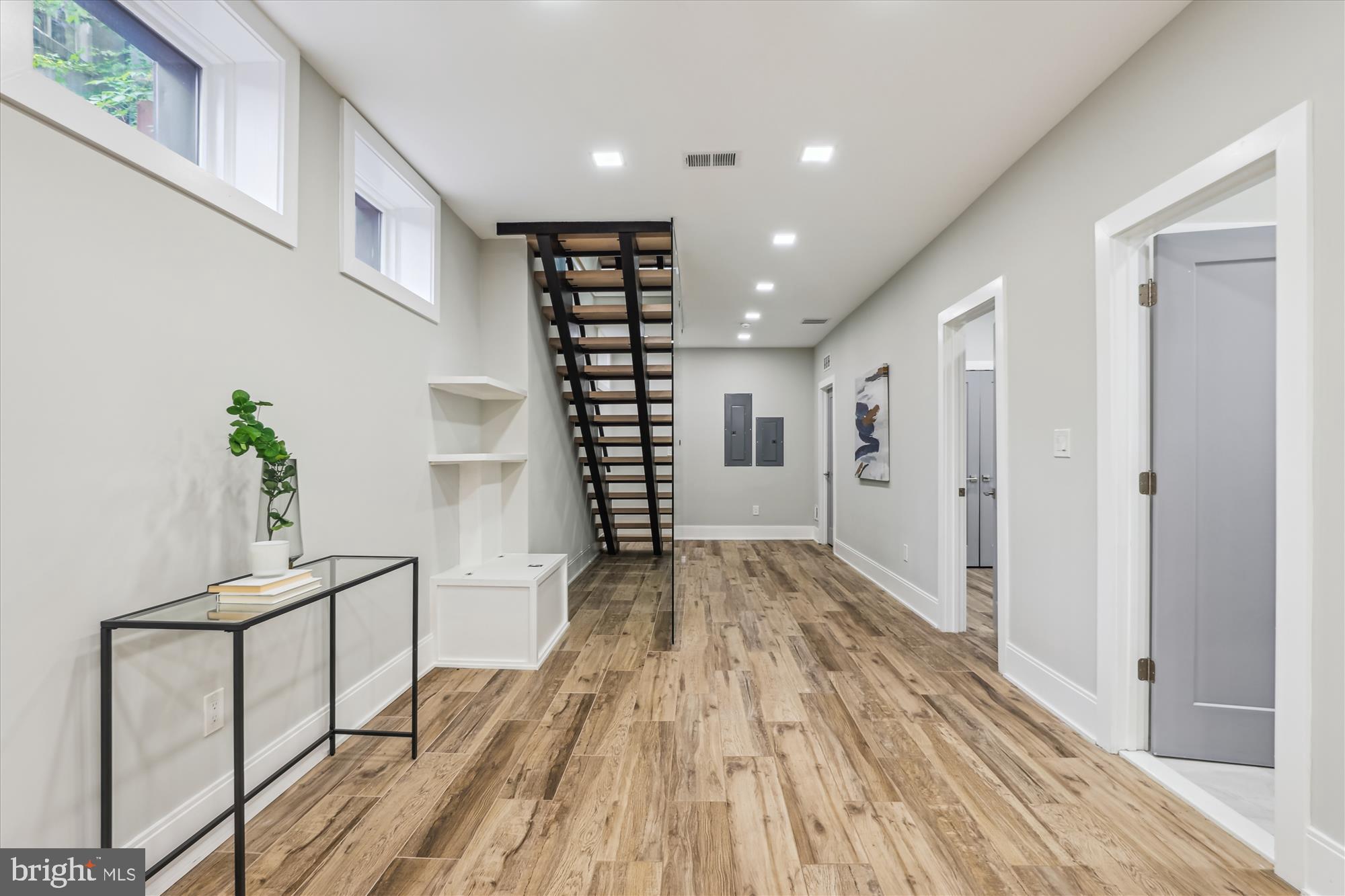 5706 Nevada Avenue Northwest Washington, DC 20015 - Photo 27 of 39 a view of empty room with wooden floor and fan