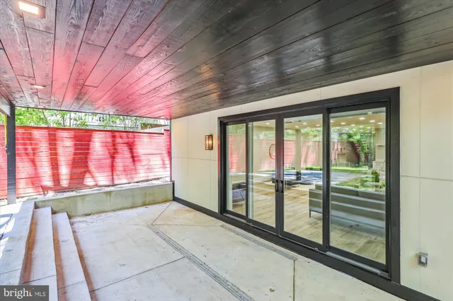a view of a porch with a backyard