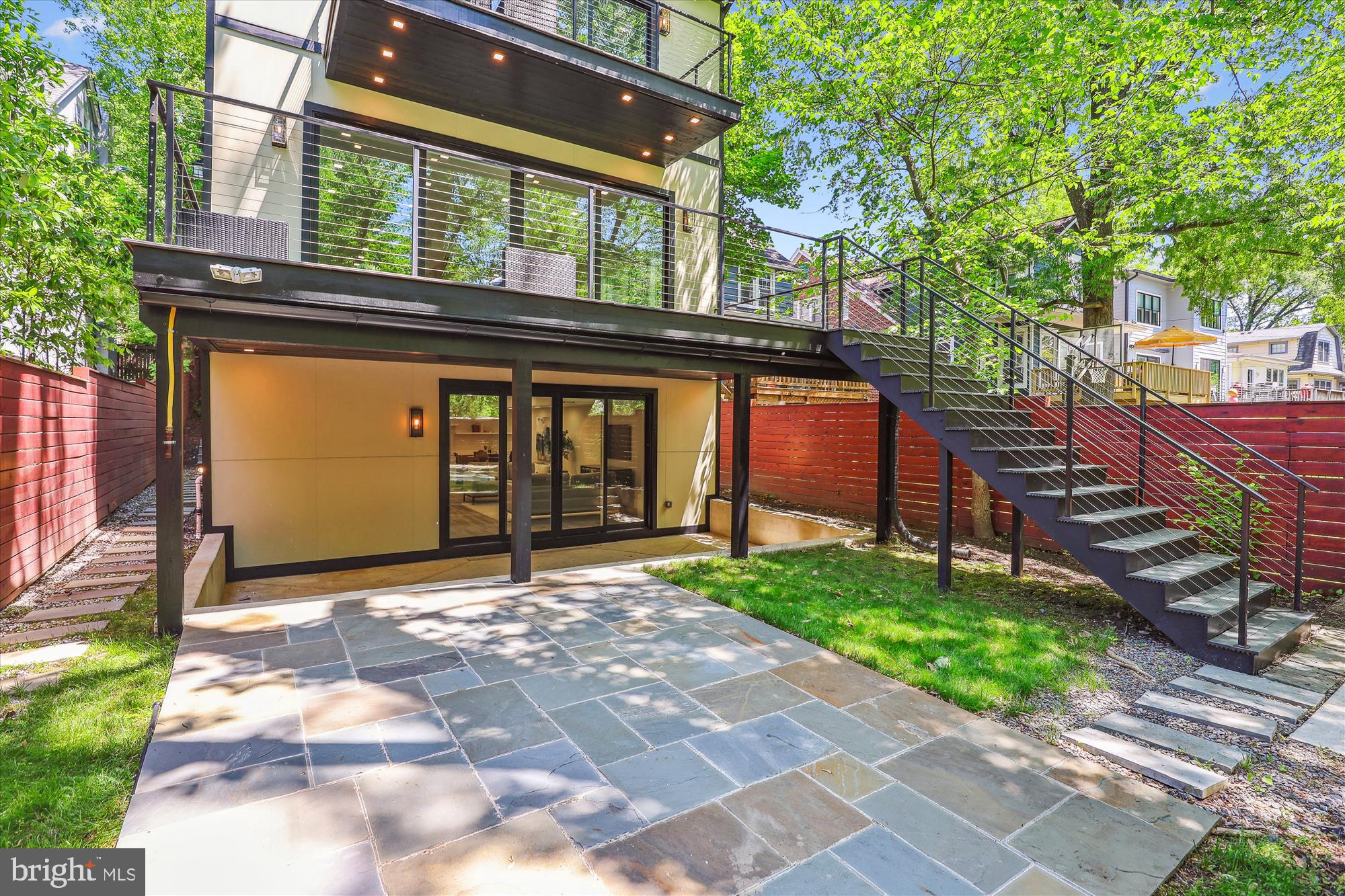 5706 Nevada Avenue Northwest Washington, DC 20015 - Photo 32 of 39 a front view of a house with a garden