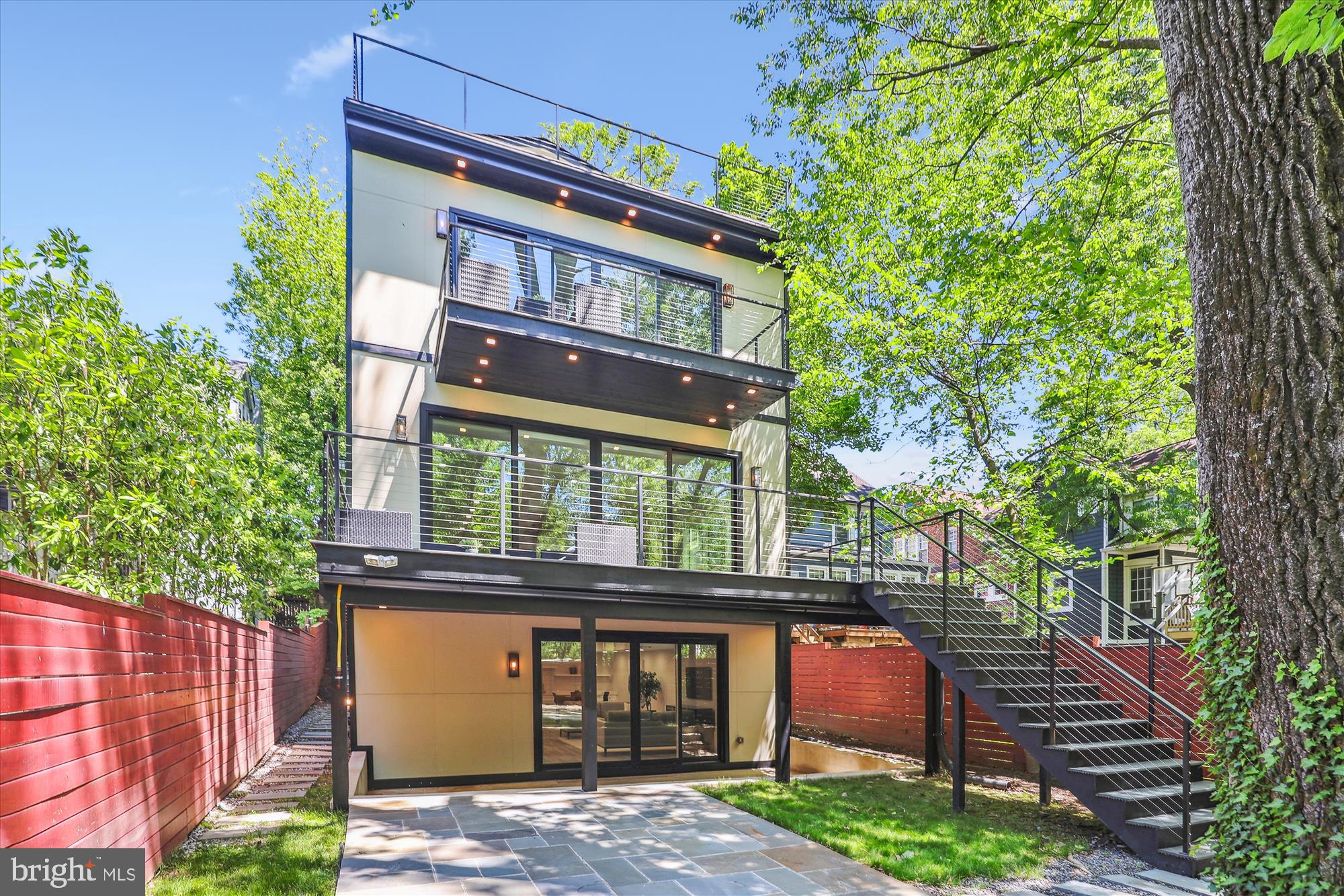 5706 Nevada Avenue Northwest Washington, DC 20015 - Photo 33 of 39 a front view of a house with a yard