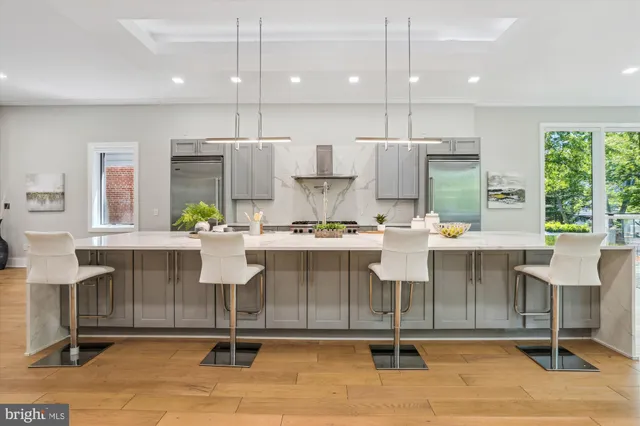 a room with lots of furniture and windows