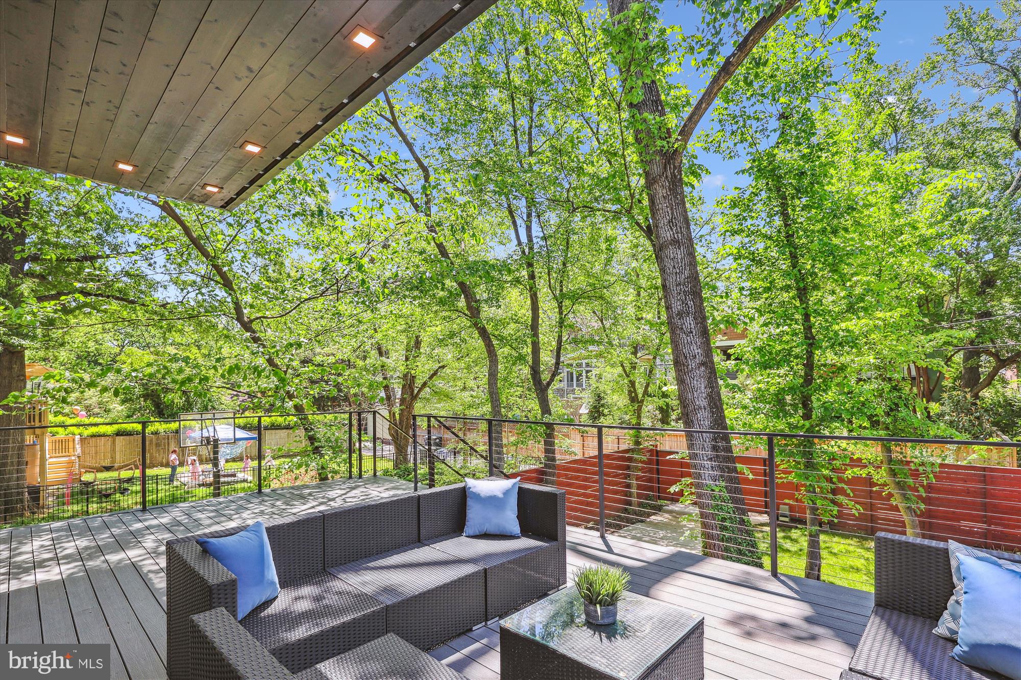 5706 Nevada Avenue Northwest Washington, DC 20015 - Photo 9 of 39 a view of a patio with couches and a fire pit