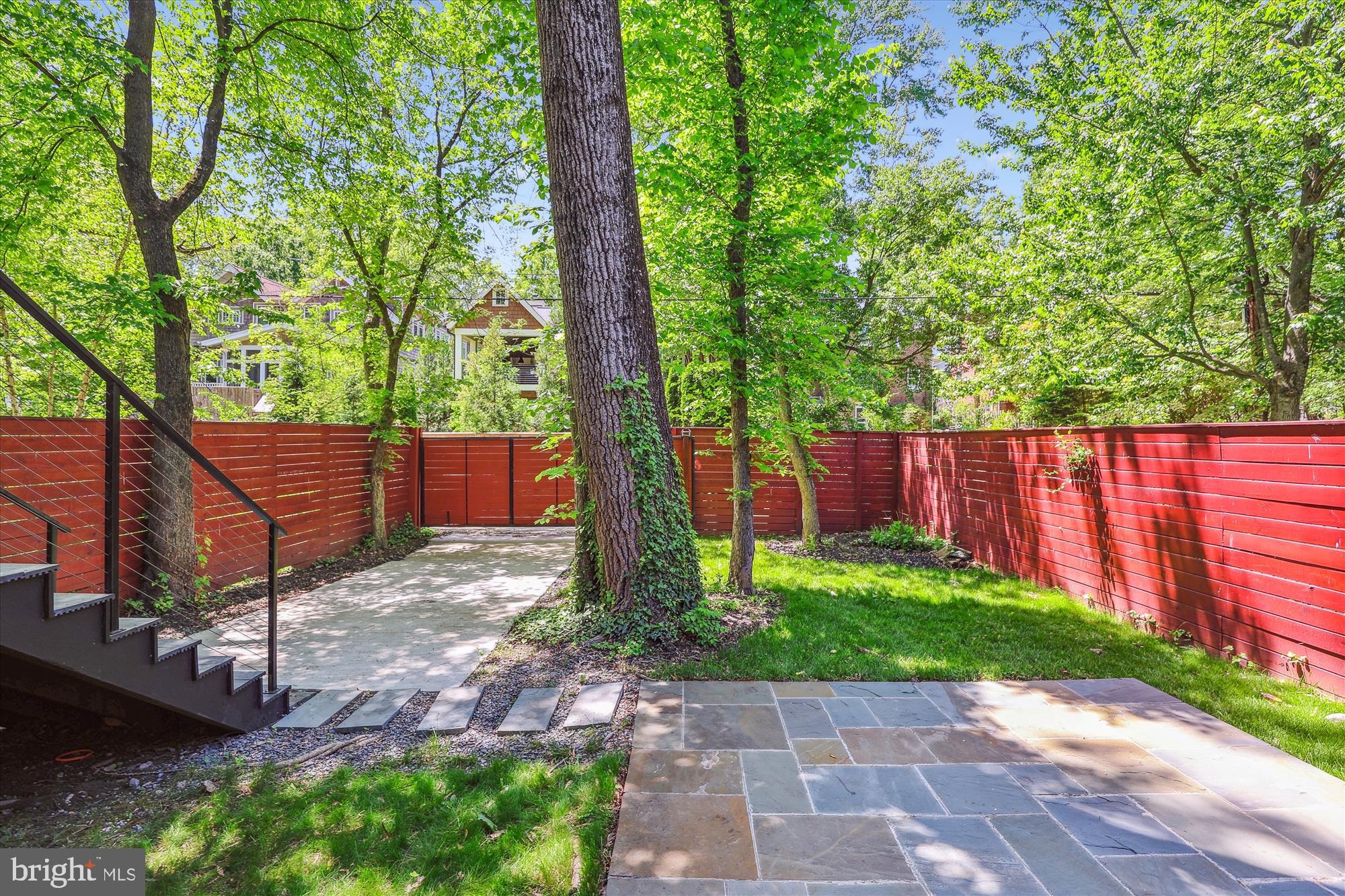 5706 Nevada Avenue Northwest Washington, DC 20015 - Photo 10 of 39 a backyard of a house with lots of green space