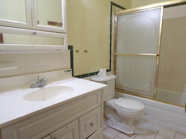 1620 Bluebell Street Amarillo, TX 79107 - Photo 17 of 28 a bathroom with a sink a toilet and shower