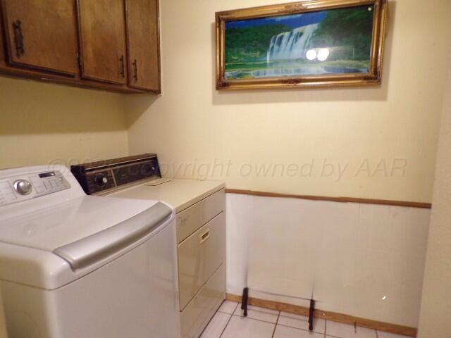 1620 Bluebell Street Amarillo, TX 79107 - Photo 19 of 28 a utility room with dryer and washer