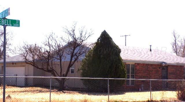 1620 Bluebell Street Amarillo, TX 79107 - Photo 2 of 28 a view of a balcony with yard