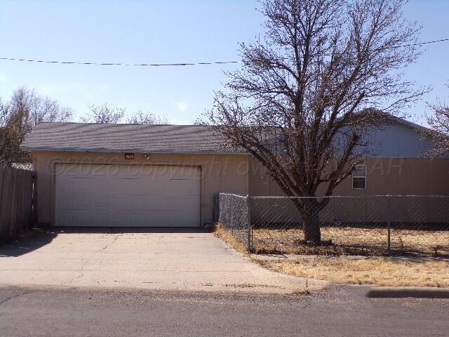 1620 Bluebell Street Amarillo, TX 79107 - Photo 26 of 28 a front view of a house with a yard