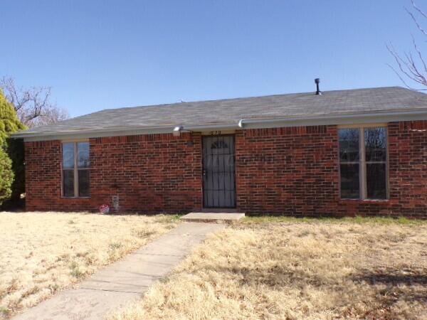 1620 Bluebell Street Amarillo, TX 79107 - Photo 27 of 28 a front view of a house with a yard