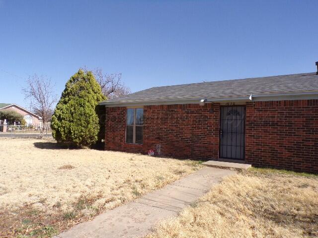 1620 Bluebell Street Amarillo, TX 79107 - Photo 28 of 28 a view of a yard covered in snow