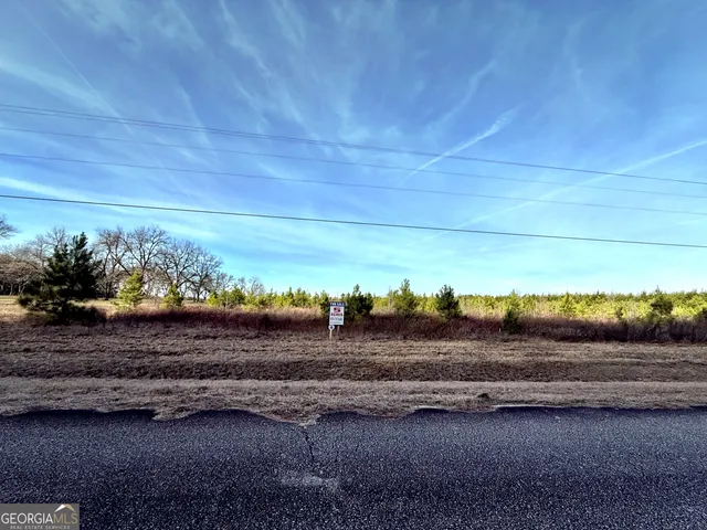 a view of a road with an ocean view
