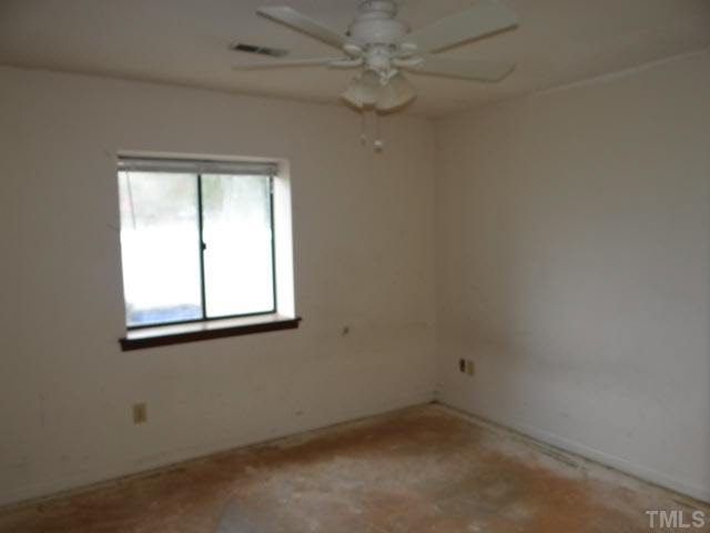 5010 Casa Del Rey Drive Raleigh, NC 27616 - Photo 8 of 10 an empty room with a window