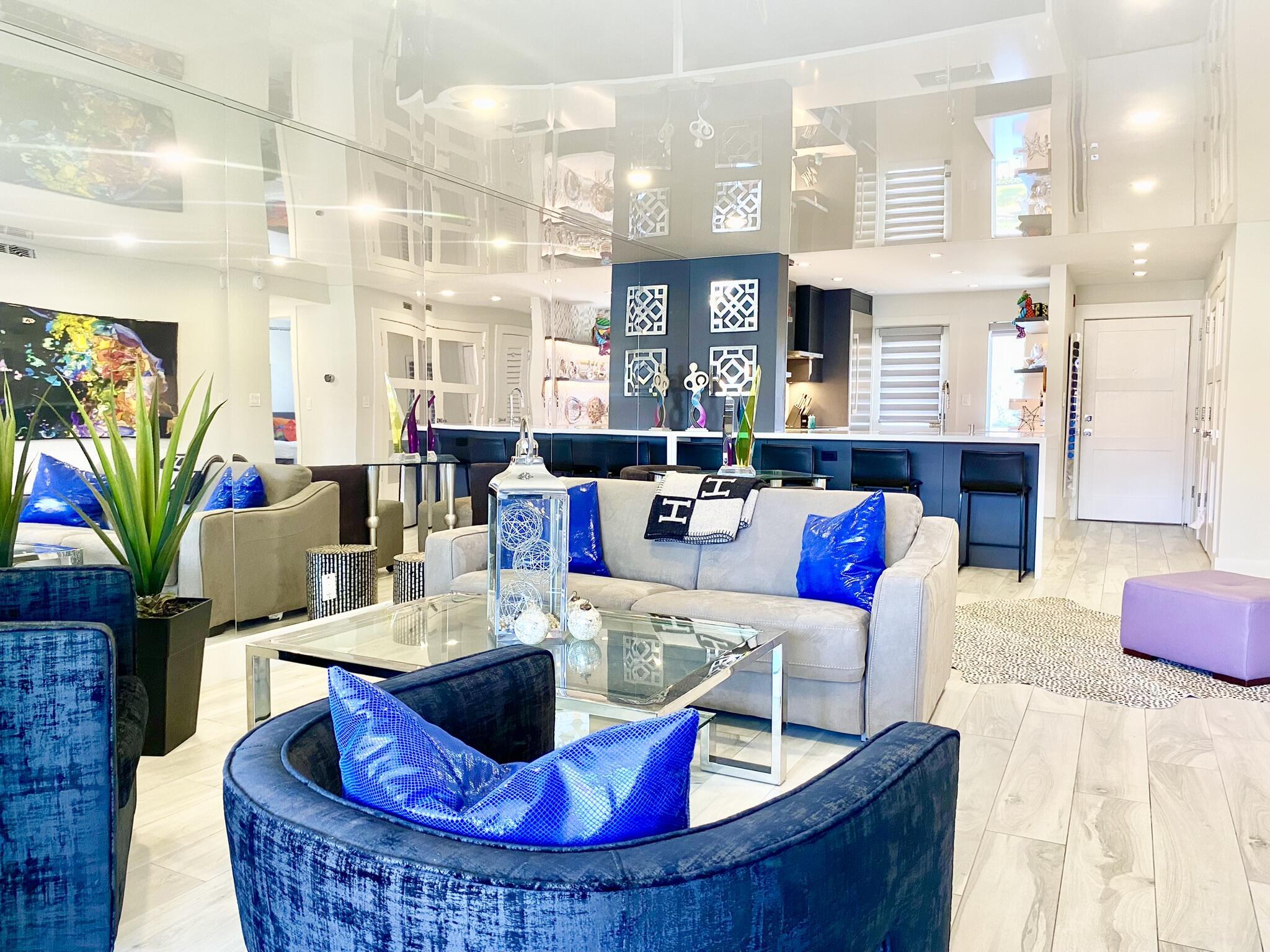 2871 North Ocean Boulevard, Unit M330 Boca Raton, FL 33431 - Photo 14 of 60 a living room with furniture kitchen view and a large window