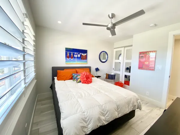 a view of a chairs and table in the balcony
