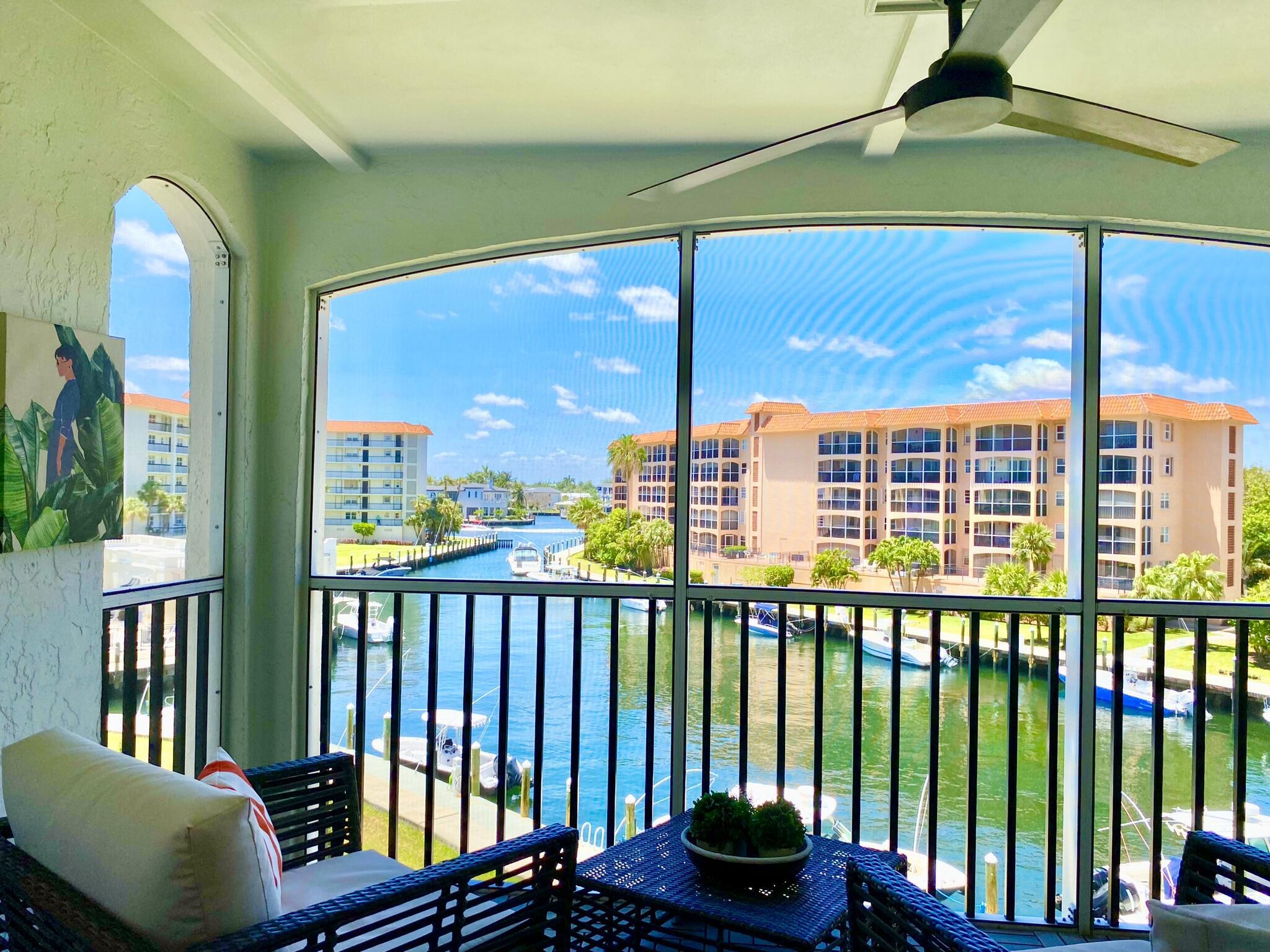 2871 North Ocean Boulevard, Unit M330 Boca Raton, FL 33431 - Photo 32 of 60 a view of a balcony with couch and chairs