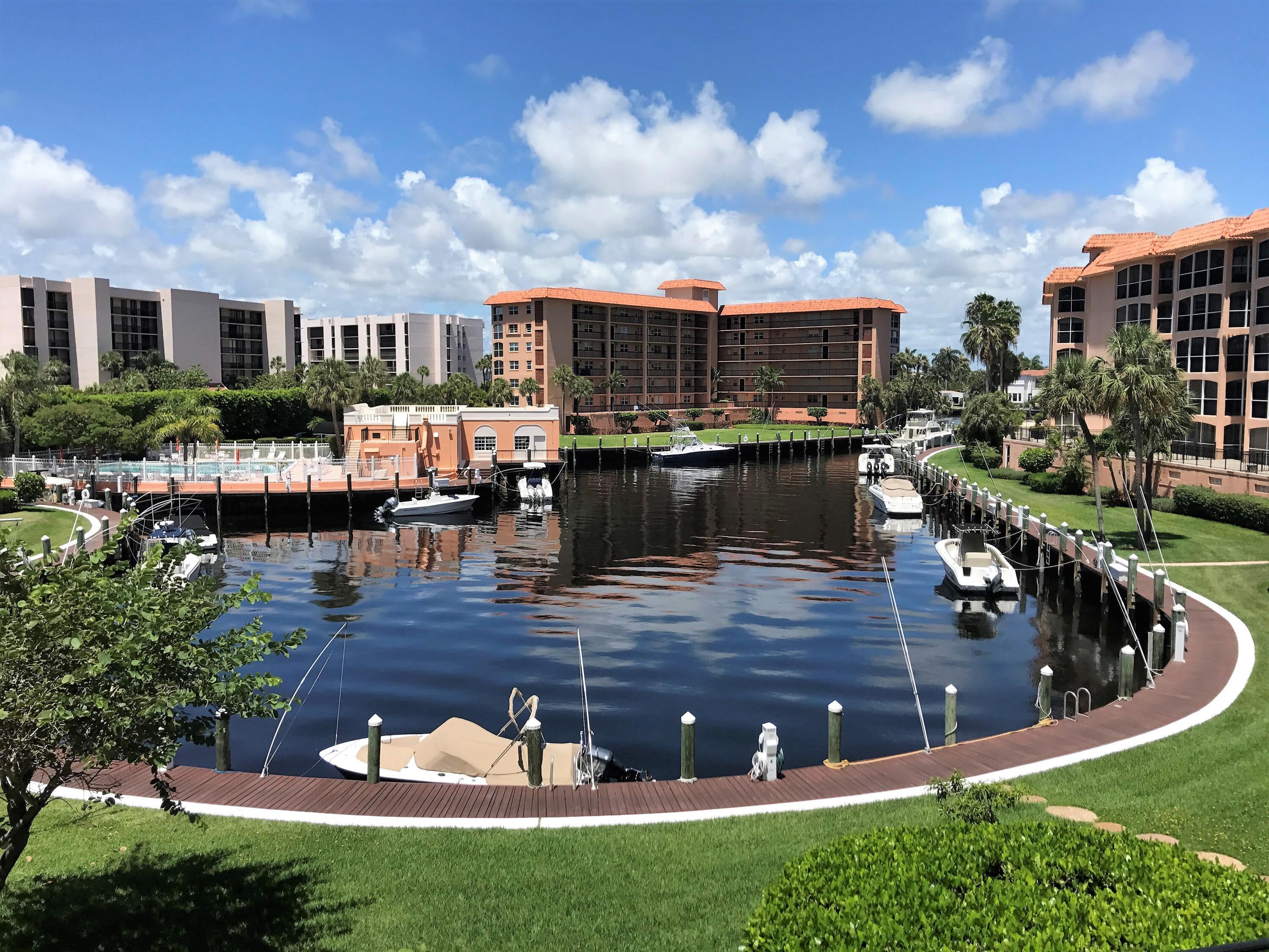 2871 North Ocean Boulevard, Unit M330 Boca Raton, FL 33431 - Photo 34 of 60 a swimming pool view with a seating space and garden view