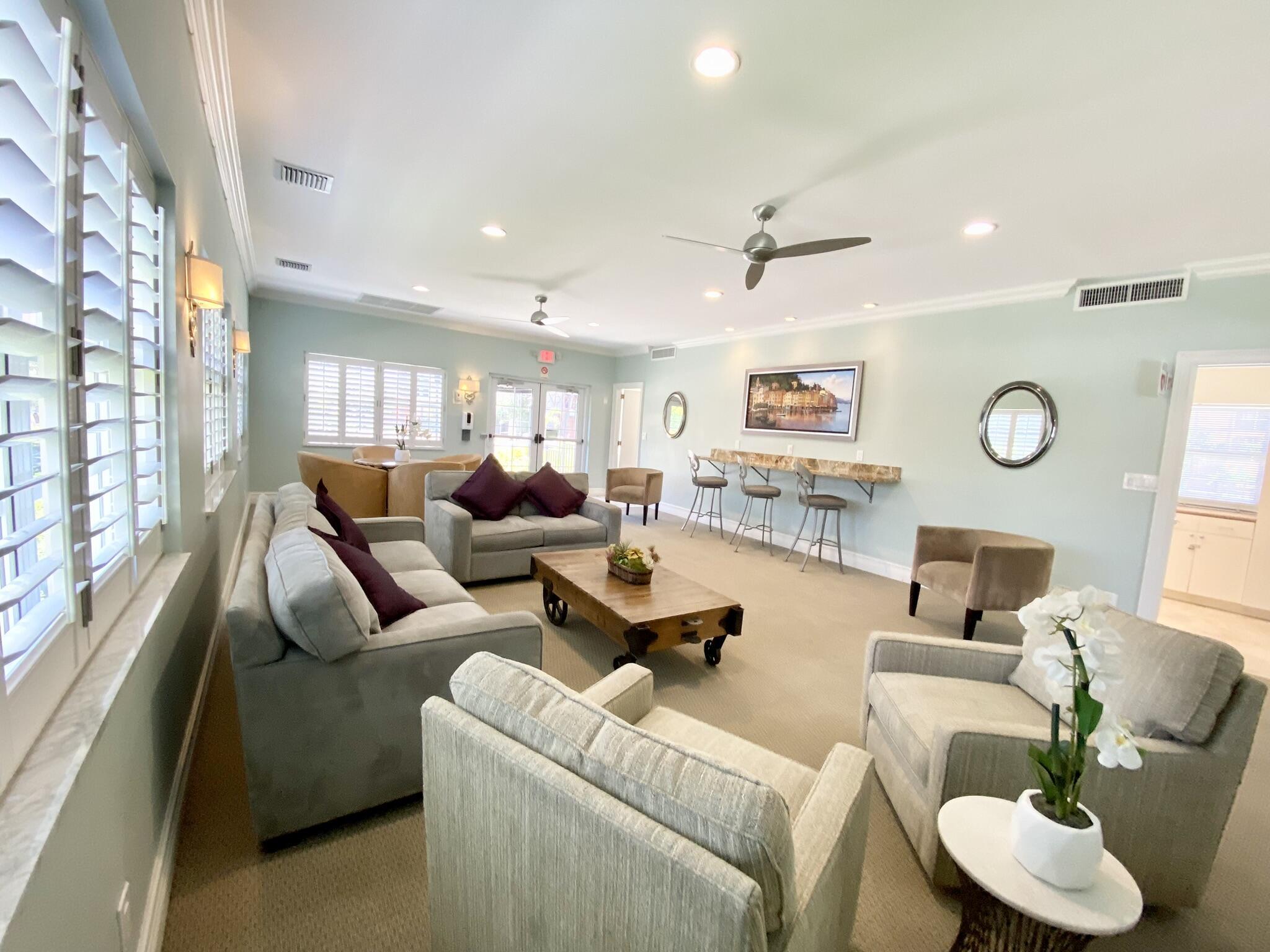 2871 North Ocean Boulevard, Unit M330 Boca Raton, FL 33431 - Photo 41 of 60 a living room with furniture and a large window