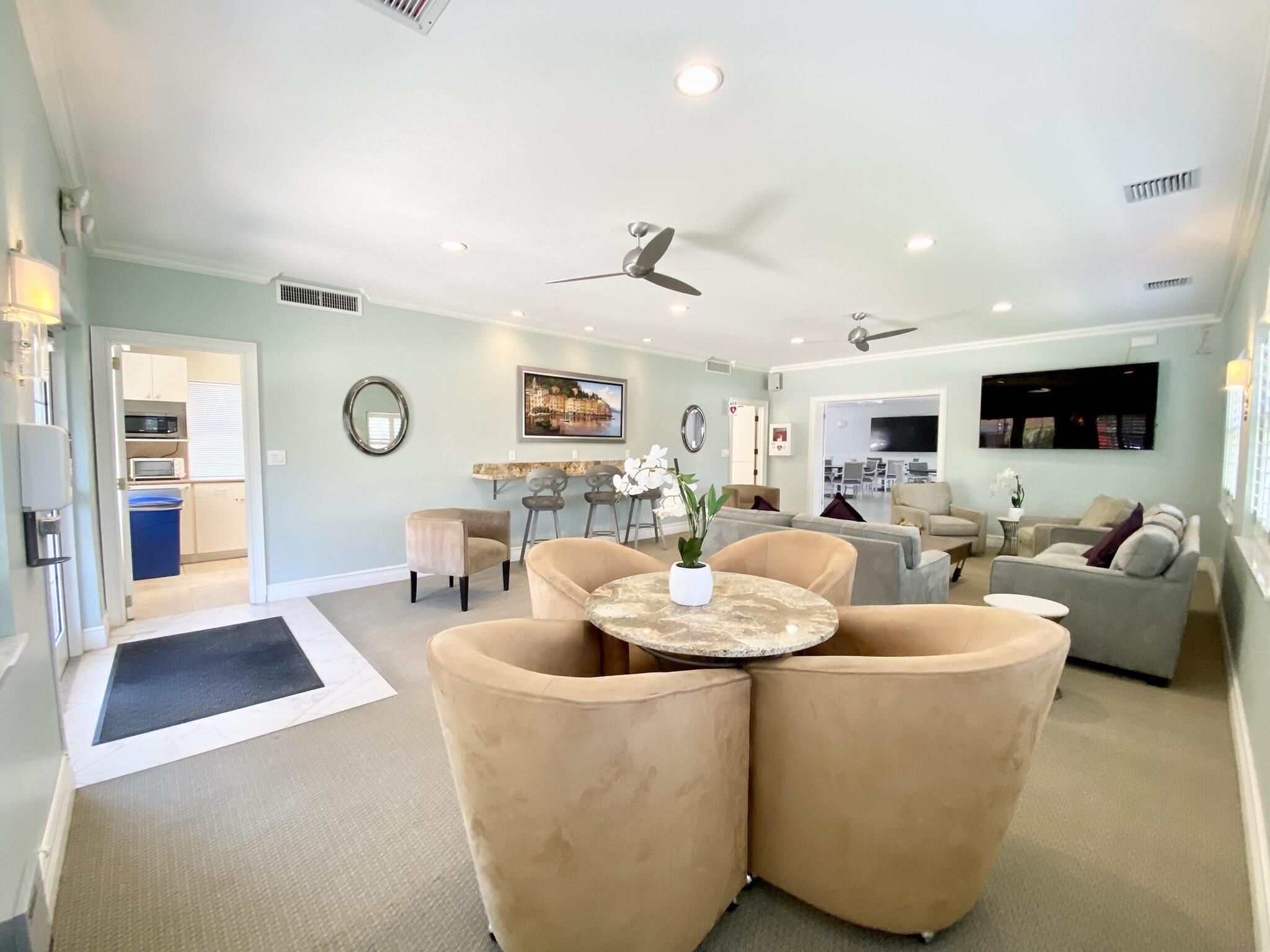 2871 North Ocean Boulevard, Unit M330 Boca Raton, FL 33431 - Photo 42 of 60 a living room with furniture and wooden floor
