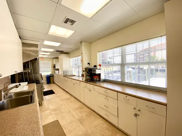 a view of a lake with tall buildings