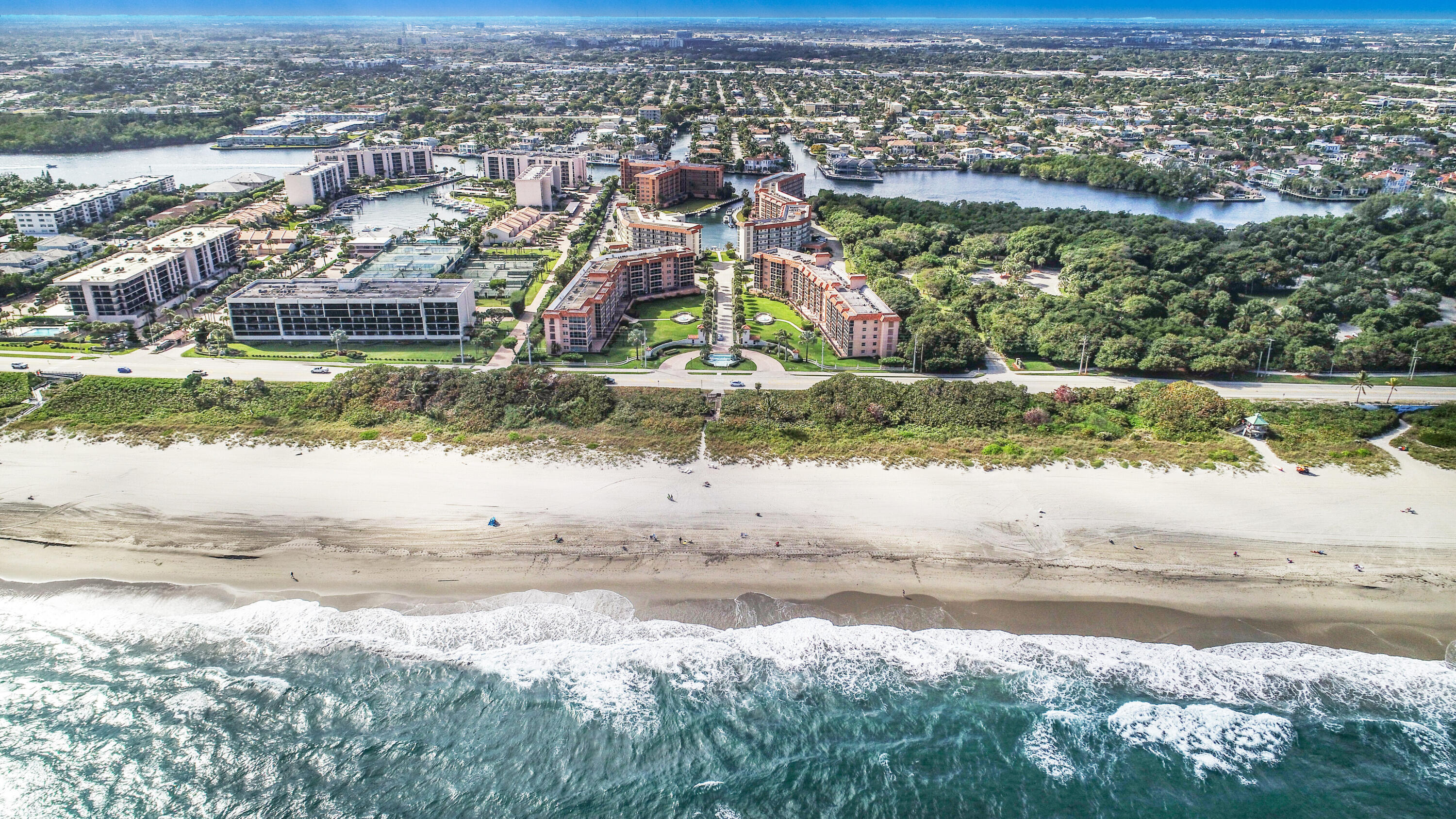 2871 North Ocean Boulevard, Unit M330 Boca Raton, FL 33431 - Photo 50 of 60 an aerial view of residential houses with outdoor space and swimming pool