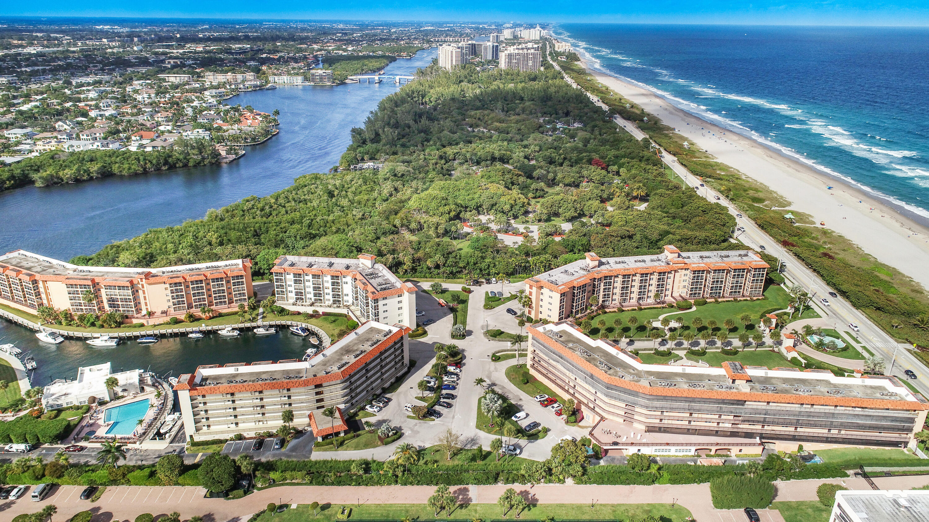 2871 North Ocean Boulevard, Unit M330 Boca Raton, FL 33431 - Photo 51 of 60 an aerial view of residential houses with outdoor space