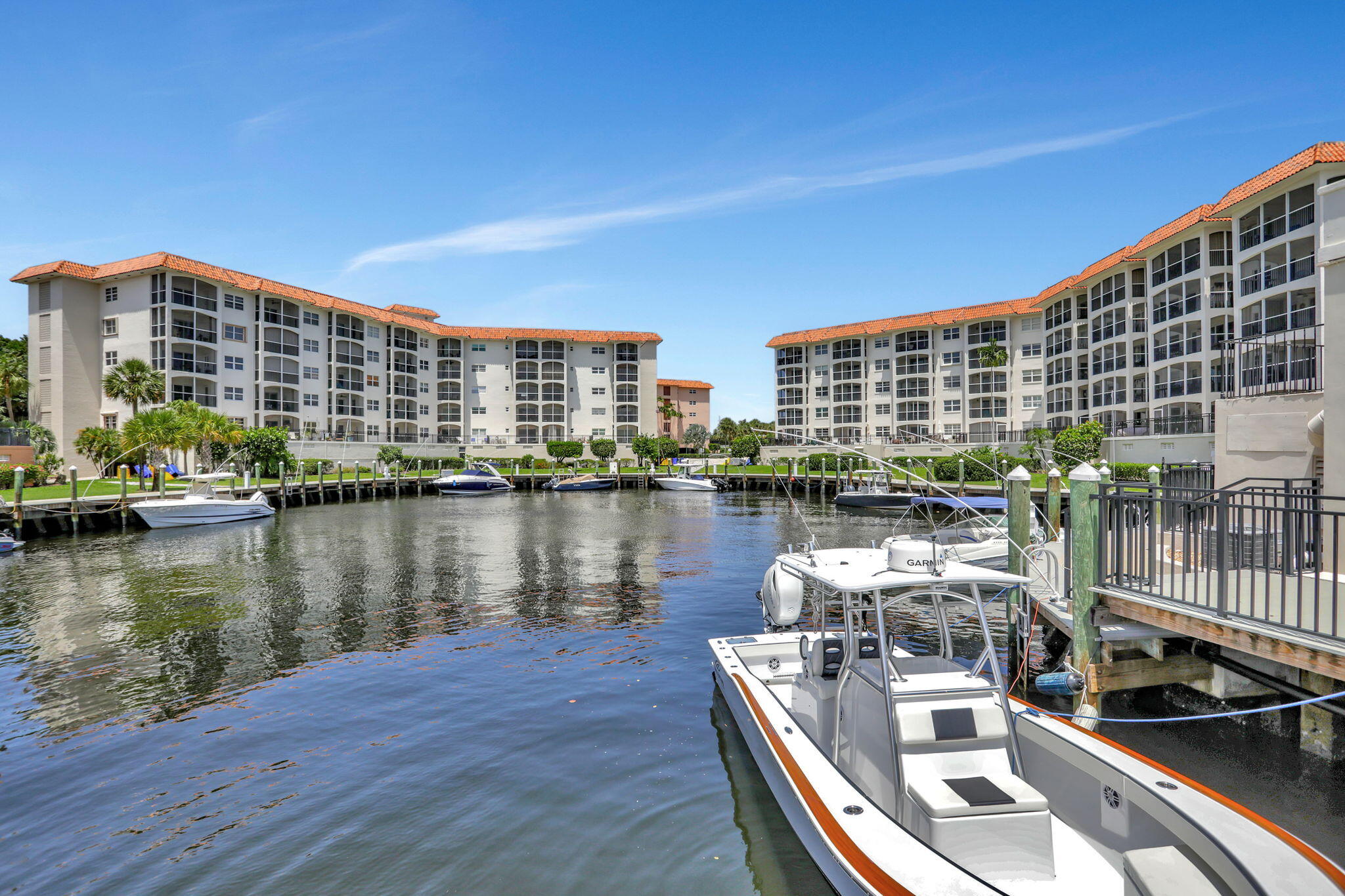 2871 North Ocean Boulevard, Unit M330 Boca Raton, FL 33431 - Photo 52 of 60 a view of a lake with tall buildings