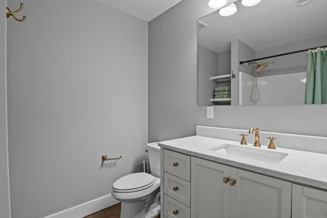 a view of a deck with wooden floor and seating space