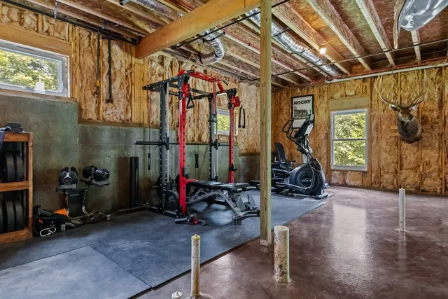 a view of white pool with a yard