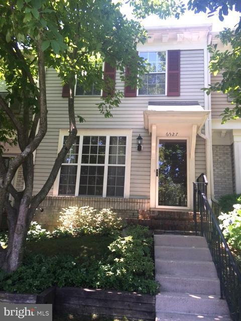 6527 Cypress Point Road Alexandria, VA 22312 - Photo 1 of 16 a view of a house with a yard
