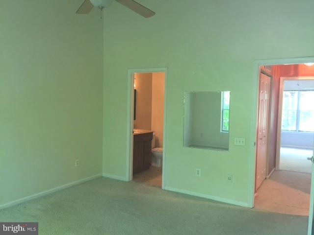 6527 Cypress Point Road Alexandria, VA 22312 - Photo 13 of 16 an empty room with an entrance to other room