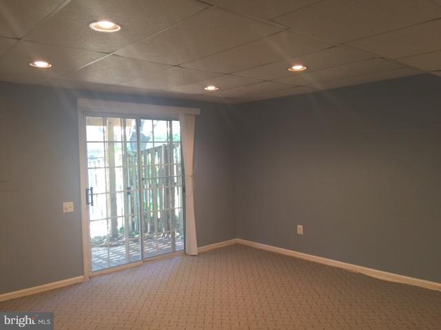 6527 Cypress Point Road Alexandria, VA 22312 - Photo 14 of 16 an empty room with windows