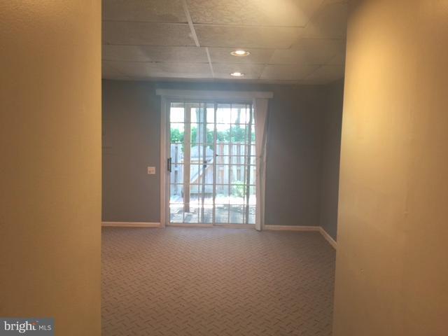 6527 Cypress Point Road Alexandria, VA 22312 - Photo 15 of 16 a view of an empty room with a window