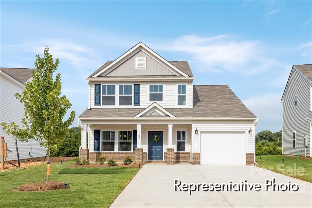 321 Copes Court, Unit 48 Kannapolis, NC 28081 - Photo 1 of 18 a front view of a house with a yard