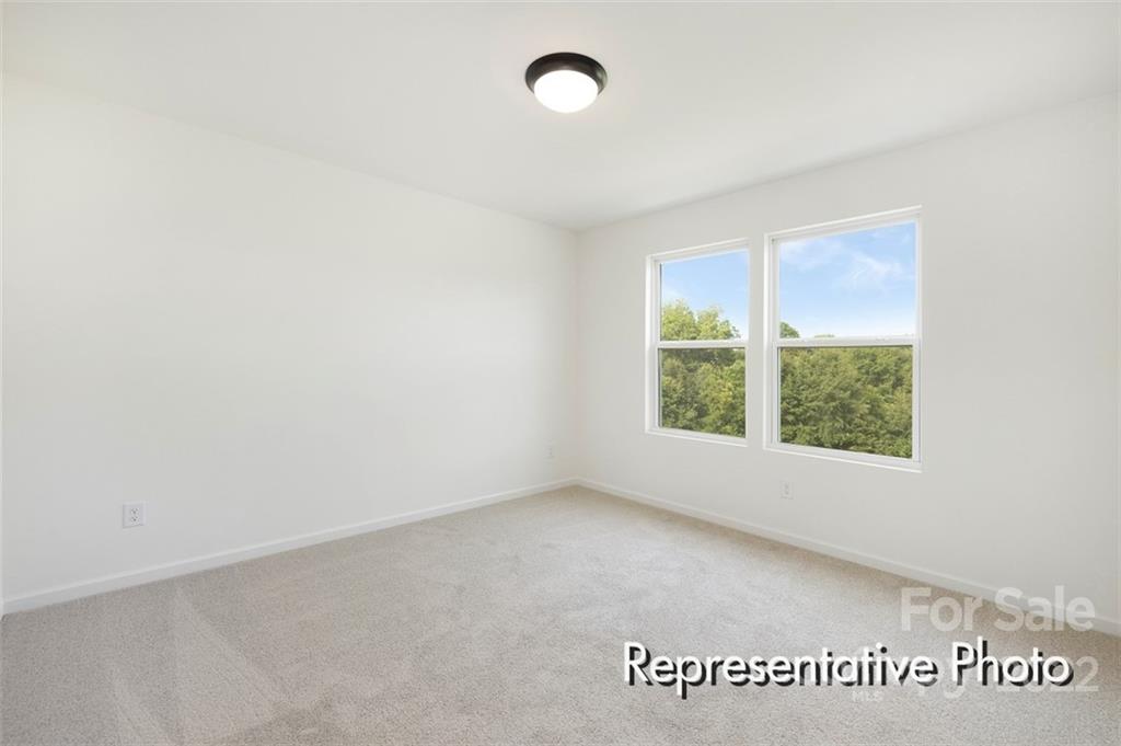 321 Copes Court, Unit 48 Kannapolis, NC 28081 - Photo 12 of 18 an empty room with a window