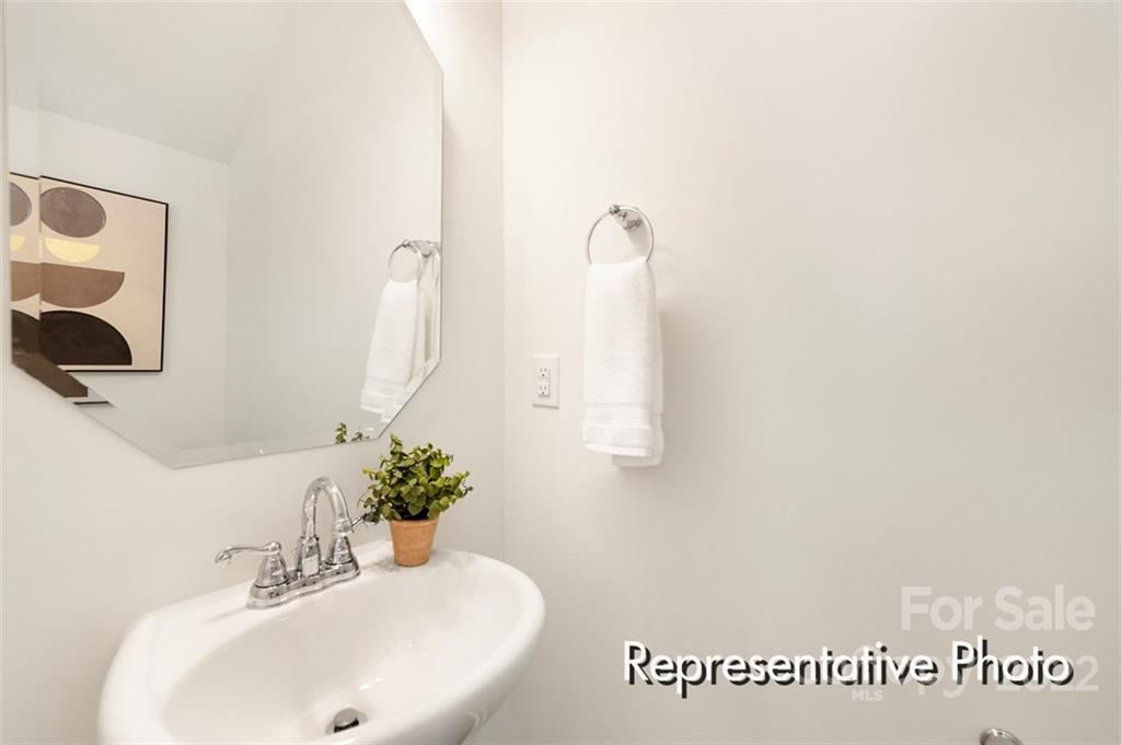 321 Copes Court, Unit 48 Kannapolis, NC 28081 - Photo 16 of 18 a bathroom with a sink and a mirror