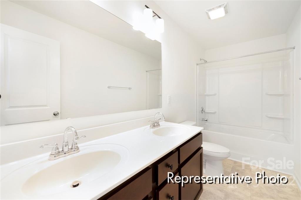 321 Copes Court, Unit 48 Kannapolis, NC 28081 - Photo 17 of 18 a bathroom with a sink and a bathtub